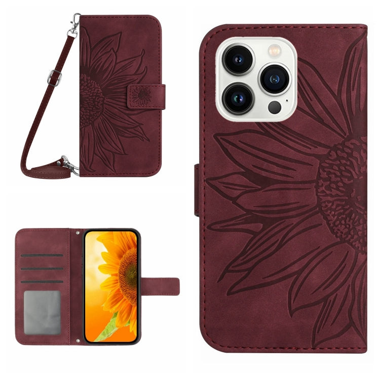 For iPhone 16 Pro Skin Feel Sun Flower Embossed Flip Leather Phone Case with Lanyard(Wine Red) - iPhone 16 Pro Cases by buy2fix | Online Shopping UK | buy2fix